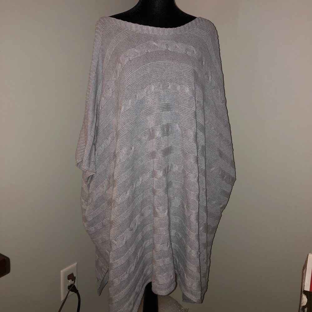 Cable knit poncho style sweater